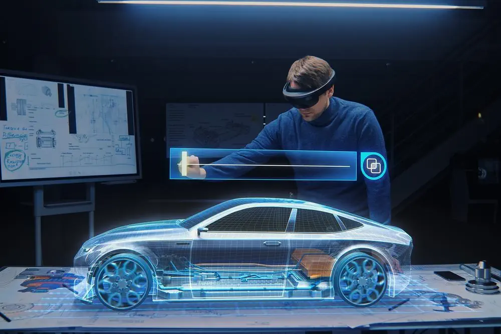 Automobilingenieur, der ein VR-Headset trägt und arbeitet